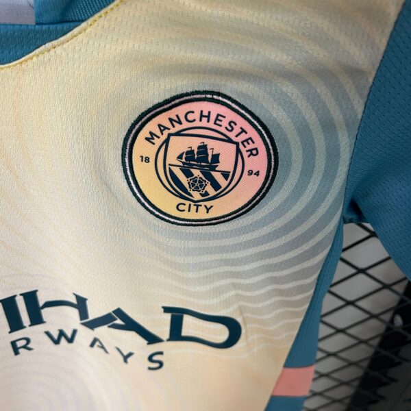 Kit Bambino - Manchester City Fourth 24/25 - immagine 7